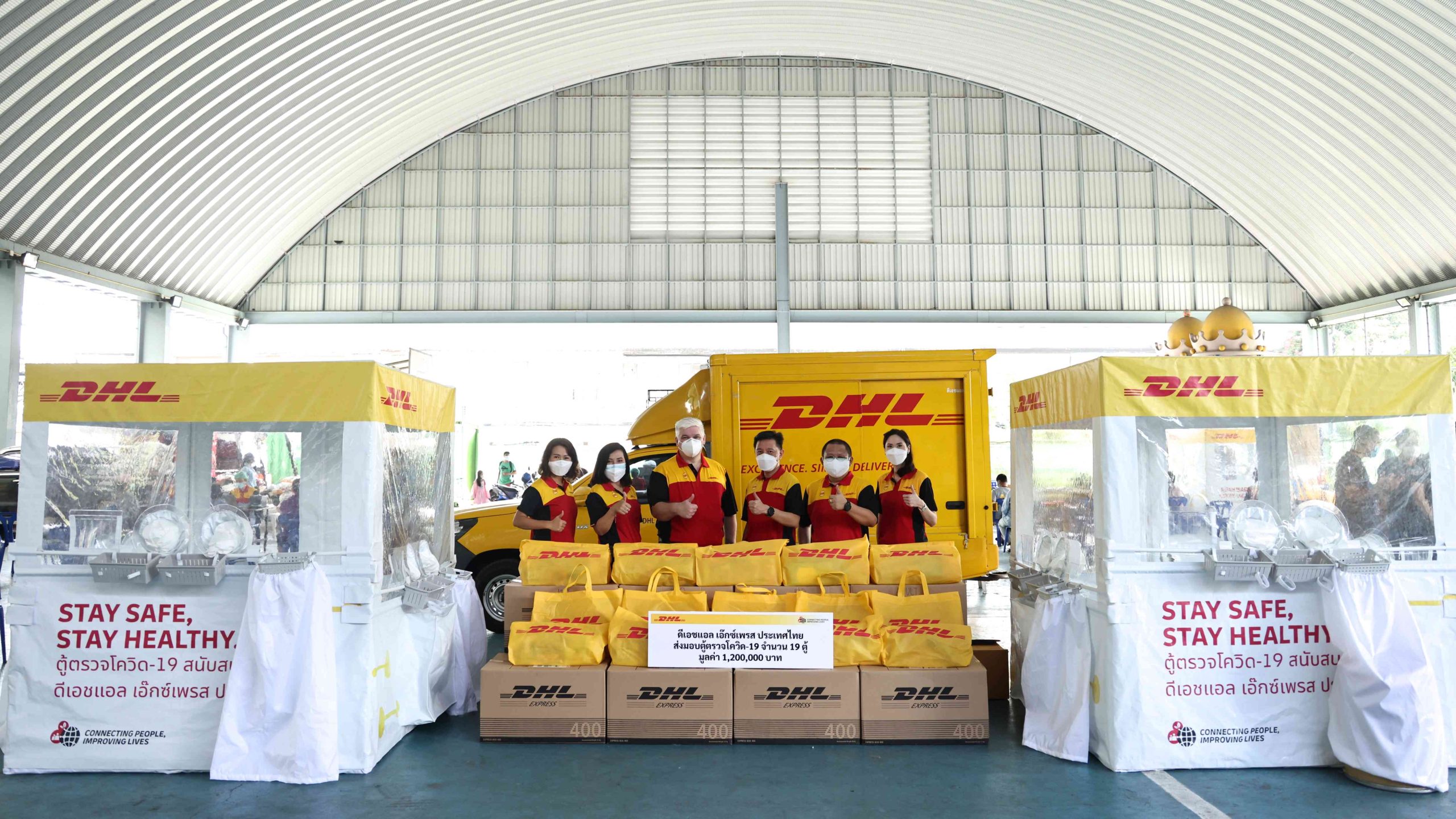 DHL Express Thailand management team and the positive pressure cabinet for COVID 19 swab testing re 1 scaled
